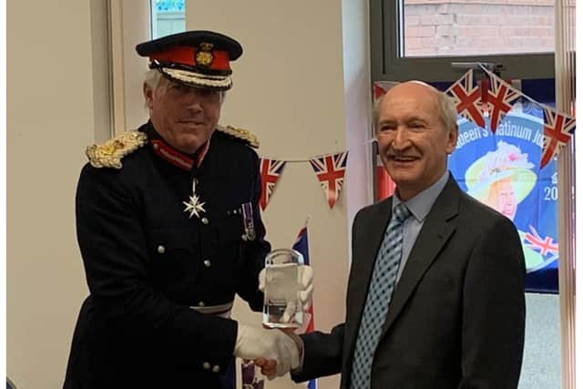 On Wednesday (October 26), the Lord Lieutenant for Warwickshire, Tim Cox, presented award to Tony Brittan, founder of the Pam Britton Trust. The award is for the team of volunteers, including Tony, who runs around 12 regular get-togethers for those living with dementia and their carers. Photo supplied