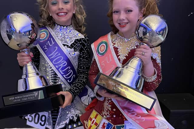 Willow (left) Sinead (right) with their Worlds globes