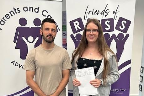 Head of Sixth Form at Rugby Free School Mitch Chadwick with one of the student who received their results. Photo supplied by Rugby Free School