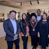James Rogan, co-director of Uprising; Lorna Tavares; Cllr Carolyn Watson-Merret, then Mayor of Rugby; Robert Ruddock; Cllr Brenda Dacres, Deputy Mayor of Lewisham - and MP Mark Pawsey, attended the New Cross fire remembrance event at Rugby Art Gallery and Museum in January.