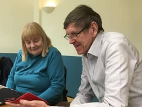 Computer Café volunteer John Morgan helps Janina Stanway with I.T. Photo supplied