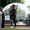 Gary Lucy and Pete Wicks with their dates outside a pod.  Photo by Lime Pictures