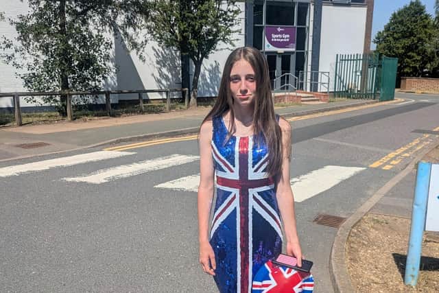 Courtney outside Bilton School.