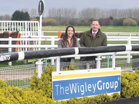 Yasmin Audhali, corporate fundraiser at The Myton Hospices, with Wigley chief executive officer James Davies at Warwick Racecourse. Photo supplied