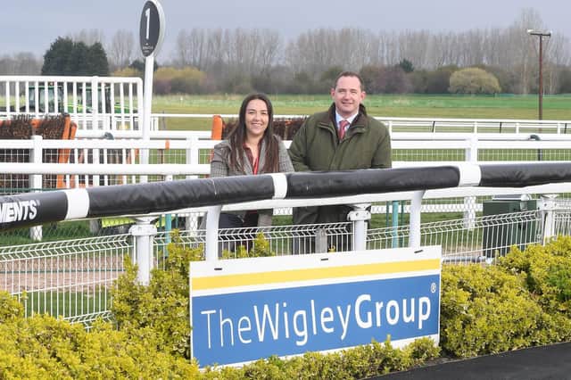 Yasmin Audhali, corporate fundraiser at The Myton Hospices, with Wigley chief executive officer James Davies at Warwick Racecourse. Photo supplied