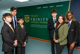 Samirah Roberts, Trinity Catholic School's leader and improvement lead, with pupils at the school. Photo by Mike Baker