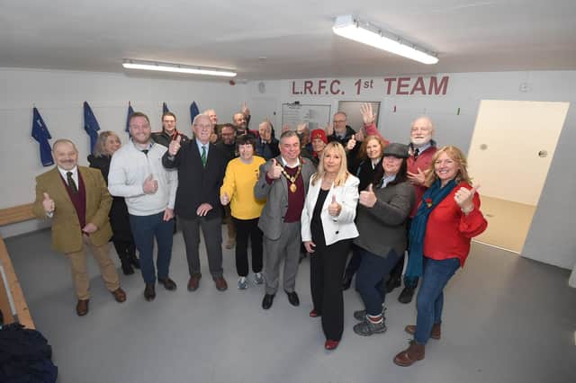 Visitors get a tour of the new Lutterworth rugby club changing room.
PICTURE: ANDREW CARPENTER