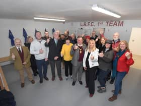Visitors get a tour of the new Lutterworth rugby club changing room.
PICTURE: ANDREW CARPENTER