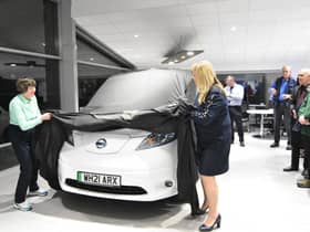 Janette Ackerley and Rosita Page unveiling vehicle