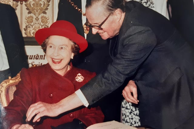 The Queen enters her name into the Regent Hotel's visitors' book with hotel owner Frank Cridlan and his wife may - after a spot of bother with a faulty pen!
Mr Cridlan said of the pen: "Ma'am like myself it's a little nervous."