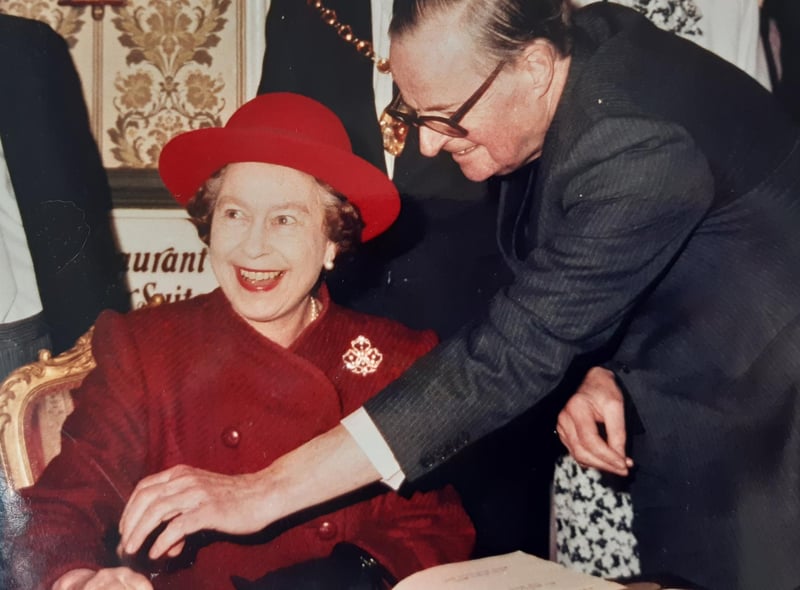 The Queen enters her name into the Regent Hotel's visitors' book with hotel owner Frank Cridlan and his wife may - after a spot of bother with a faulty pen!
Mr Cridlan said of the pen: "Ma'am like myself it's a little nervous."