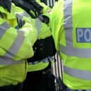 Two off-duty police officers sprang into action to help save the life of a cyclist after he collapsed near Warwick. Stock image