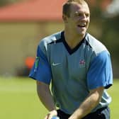 An old picture of Mike Tindall passing the ball during training.  (Photo by David Rogers/Getty Images)