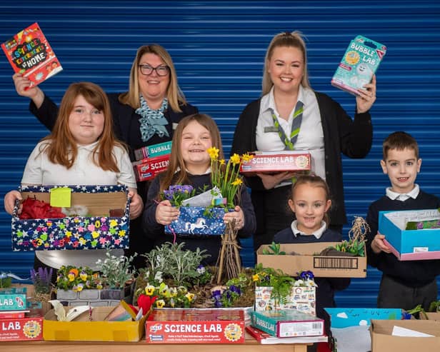 Val and Alex (Sales Advisers) with winners (left to right) Lola, April, Isla and Stefan. Photo by Mike Sewell