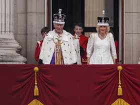 King Charles III and Queen Camilla on the Buckingham Palace balcony after the Coronation (Picture: Dan Kitwood/Getty Images)