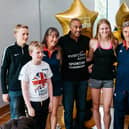 Colin Jackson with budding athletes