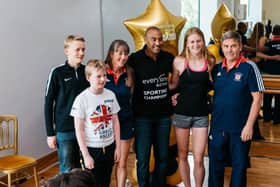 Colin Jackson with budding athletes