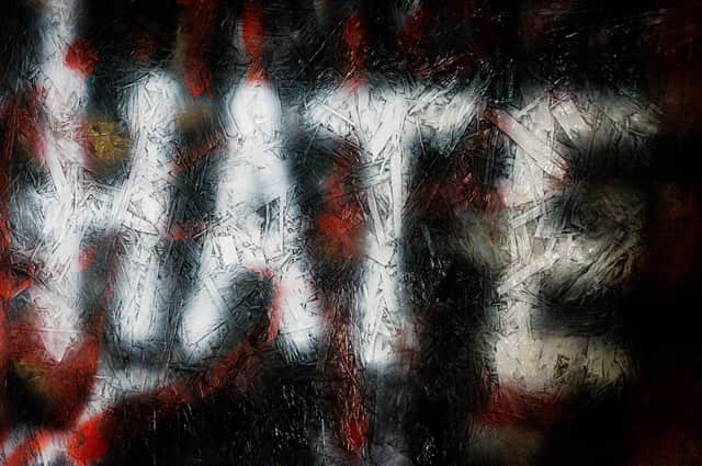 Undated file photo of graffiti on a wall.The number of hate crimes recorded by police in England and Wales has hit its highest level on record, with a 12% rise in racially motivated incidents, official figures show. There were 124,091 hate crimes recorded in the year to March 2021, according to Home Office statistics. Issue date: Tuesday October 12, 2021.
