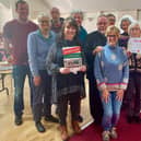 Residents and volunteers from St Vincent de Paul Society (Kenilworth) celebrating the launch of their new Community Warm Hub with (front L-R) Sue Greenway (WRCC Warm Hubs) and Pauline Hayward (Compassionate Kenilworth). Picture supplied.