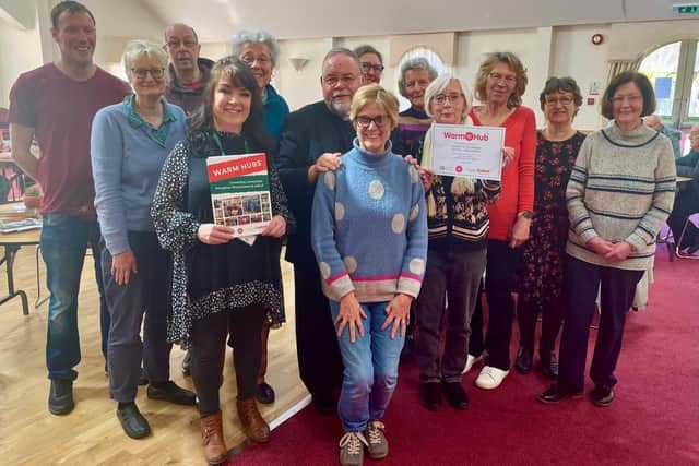 Residents and volunteers from St Vincent de Paul Society (Kenilworth) celebrating the launch of their new Community Warm Hub with (front L-R) Sue Greenway (WRCC Warm Hubs) and Pauline Hayward (Compassionate Kenilworth). Picture supplied.