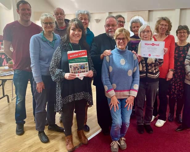 Residents and volunteers from St Vincent de Paul Society (Kenilworth) celebrating the launch of their new Community Warm Hub with (front L-R) Sue Greenway (WRCC Warm Hubs) and Pauline Hayward (Compassionate Kenilworth). Picture supplied.