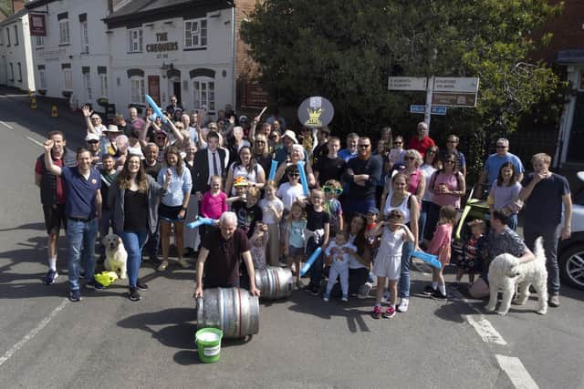 Front, Landlord Brian Priest of The Chequers pub in Swinford before the start of the 35th barrel push to Catthorpe Farm in aid of Macmillan Cancer Support.PICTURE: ANDREW CARPENTER