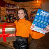 The Ale Hub in Warwick, is doing a festive drive for a charity called practical presents, with a collection box for customers to donate. Pictured: Grace Pratt - bar manager.
Photo by Mike Baker