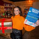 The Ale Hub in Warwick, is doing a festive drive for a charity called practical presents, with a collection box for customers to donate. Pictured: Grace Pratt - bar manager.
Photo by Mike Baker