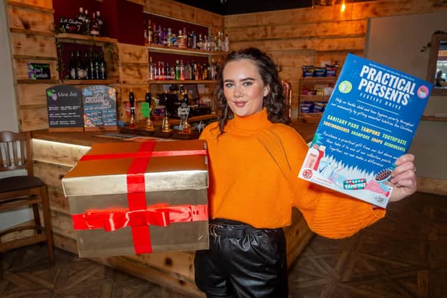 The Ale Hub in Warwick, is doing a festive drive for a charity called practical presents, with a collection box for customers to donate. Pictured: Grace Pratt - bar manager.
Photo by Mike Baker
