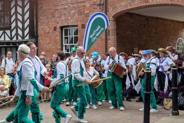 Morris Dancer groups entertained an audience outside Oken's tearooms in Castle Street after the main street procession. Photo shows the Sheffield City Morris group.