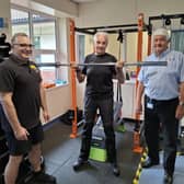 Dave Montgomery, Cardiac Rehabilitation Exercise Specialist, Stuart Boulton, Cardiac Rehabilitation patient  and Garth Murphy, Chair, The Friends of St Cross.