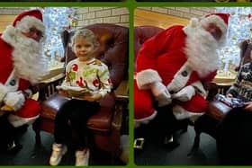 Meeting Father Christmas at the party.
