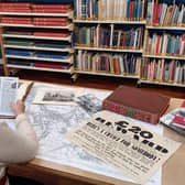 a researcher using the library local studies resources