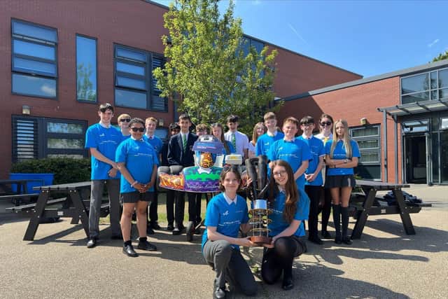 Nuneaton Academy students with their trophy and winning go-kart