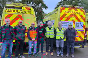 Matt Western (third from the left) with h rest of the team of volunteers an the ambulances they drove to Ukraine.