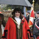 Rugby Mayor Maggie O'Rourke smiles in the rain.