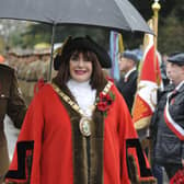 Rugby Mayor Maggie O'Rourke smiles in the rain.