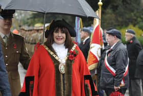 Rugby Mayor Maggie O'Rourke smiles in the rain.