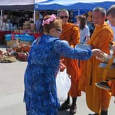 The Buddhist monks receiving gifts at the Warwick Thai Festival. Photo supplied