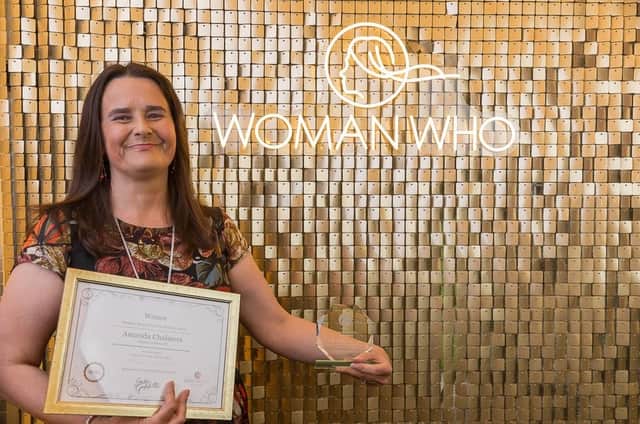 Amanda Chalmers with the award. Photo by John Cleary Photography.