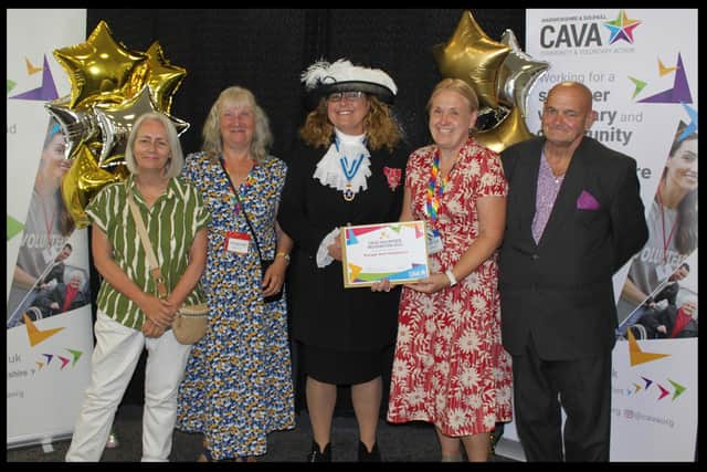 Escape Arts Volunteers receive their award. Picture supplied