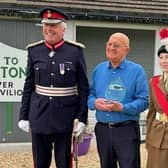 David Saul receives an award for 40 years of service as a parish councillor in Cubbington from Tim Cox the  Lord Lieutenant of Warwickshire. Picture supplied.