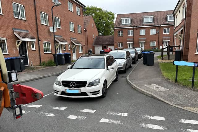 Cars are stopping refuse collectors from doing their jobs.