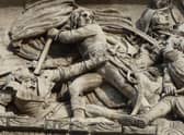 Napoleon leading the charge at the Battle of Arcole in 1796 (detail from the Arc de Triomphe)