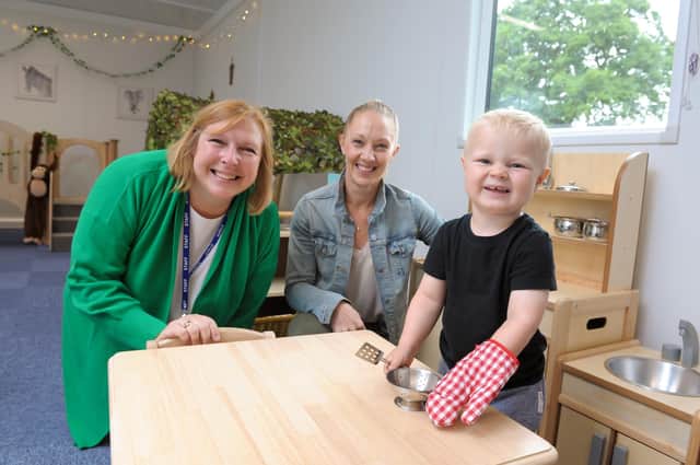 Nursery manager Anna Biddlestone,with Sam and Knox (age 2) Newton.
