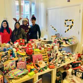 People are being asked to donate gifts which will be handed out at a local church as part of 'Susi's Christmas Appeal' (Susi is pictured on the far right).