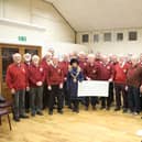The Mayor of Rugby, Cllr Carolyn Watson-Merret, came along to the Rugby Male Voice Choir's (RMVC's) open rehearsal on Monday March 6 to accept the cheque for £683.70 for the foodbank.