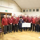 The Mayor of Rugby, Cllr Carolyn Watson-Merret, came along to the Rugby Male Voice Choir's (RMVC's) open rehearsal on Monday March 6 to accept the cheque for £683.70 for the foodbank.