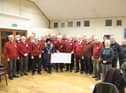 The Mayor of Rugby, Cllr Carolyn Watson-Merret, came along to the Rugby Male Voice Choir's (RMVC's) open rehearsal on Monday March 6 to accept the cheque for £683.70 for the foodbank.