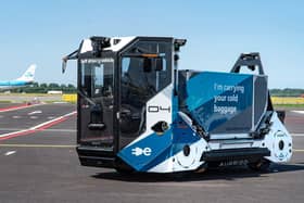 The firm's Auto-DollyTug® at Amsterdam's Schiphol Airport
